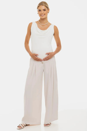 Κομψό μπεζ παντελόνι εγκυμοσύνης με πιέτες - - soonMAMA - Η σωστή προσθήκη στην κομψή και άνετη εγκυμοσύνη! - Παλτά για έγκυες