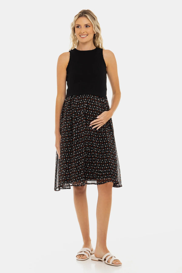 Κομψό φόρεμα με μαύρο βαμβακερό ριπ τοπ και αέρινη φούστα με λουλουδάτο μοτίβο - - soonMAMA - Η σωστή προσθήκη στην κομψή και άνετη εγκυμοσύνη! - Παλτά για έγκυες