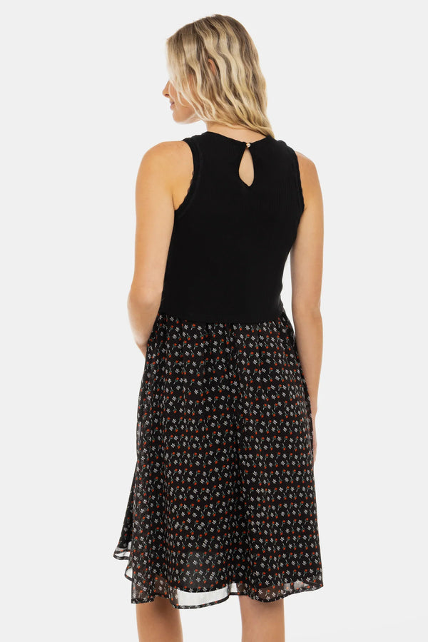 Κομψό φόρεμα με μαύρο βαμβακερό ριπ τοπ και αέρινη φούστα με λουλουδάτο μοτίβο - - soonMAMA - Η σωστή προσθήκη στην κομψή και άνετη εγκυμοσύνη! - Παλτά για έγκυες