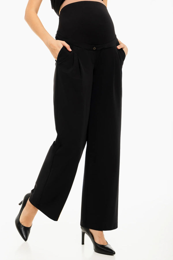 Κοφτό παντελόνι εγκυμοσύνης με πιέτες σε μαύρο χρώμα - - soonMAMA - Η σωστή προσθήκη στην κομψή και άνετη εγκυμοσύνη! - Παλτά για έγκυες