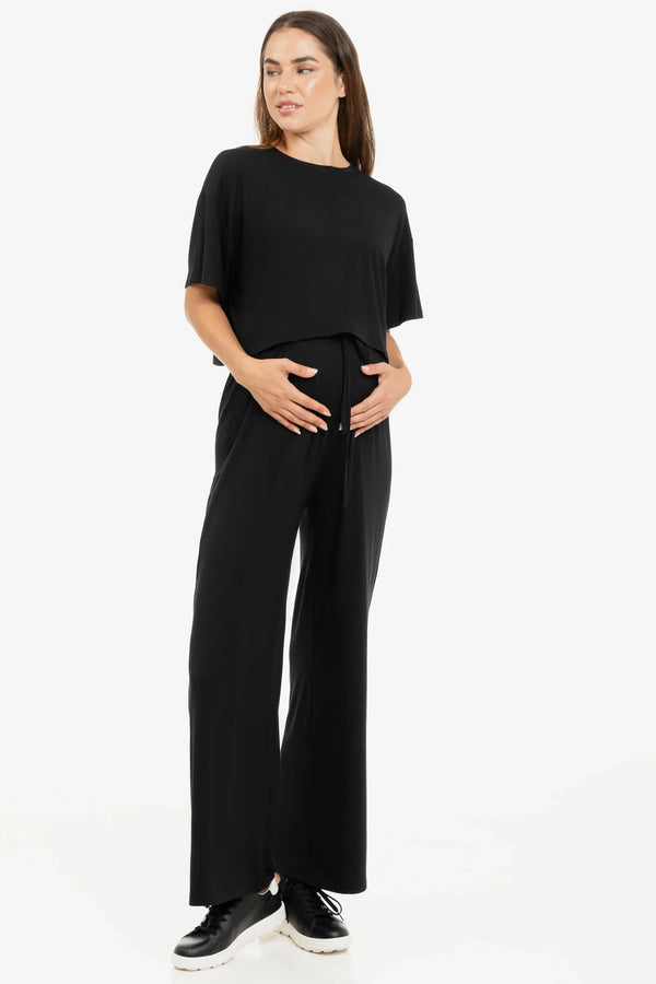 Απαλό παντελόνι εγκυμοσύνης σε γραμμή καμπάνα από modal – μαύρο - - soonMAMA - Η σωστή προσθήκη στην κομψή και άνετη εγκυμοσύνη! - Παλτά για έγκυες