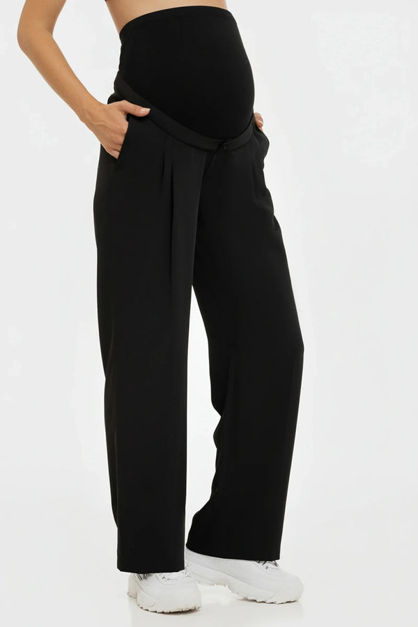 Κοφτό παντελόνι εγκυμοσύνης με πιέτες σε μαύρο χρώμα - - soonMAMA - Η σωστή προσθήκη στην κομψή και άνετη εγκυμοσύνη! - Παλτά για έγκυες