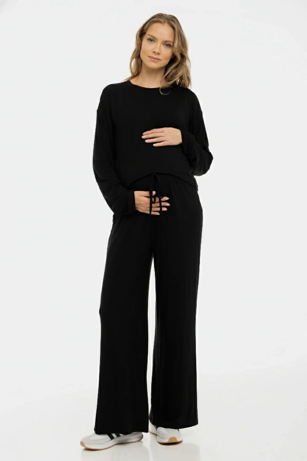 Απαλό παντελόνι εγκυμοσύνης σε γραμμή καμπάνα από modal – μαύρο - - soonMAMA - Η σωστή προσθήκη στην κομψή και άνετη εγκυμοσύνη! - Παλτά για έγκυες