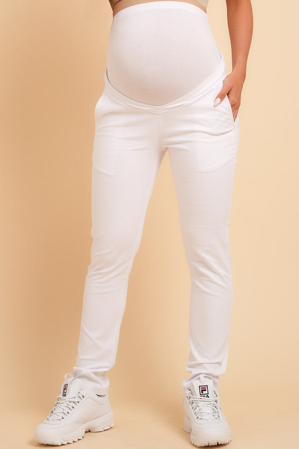 Λευκό παντελόνι εγκυμοσύνης - Clothing - soonMAMA - Η σωστή προσθήκη στην κομψή και άνετη εγκυμοσύνη! - Παλτά για έγκυες